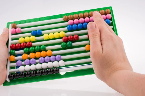 Hand Using Color Abacus — Stock Photo, Image