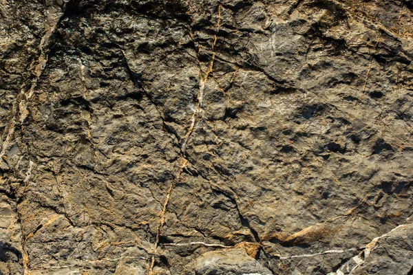 Arka plan dokusu olarak doğal kaya veya taş yüzeyi