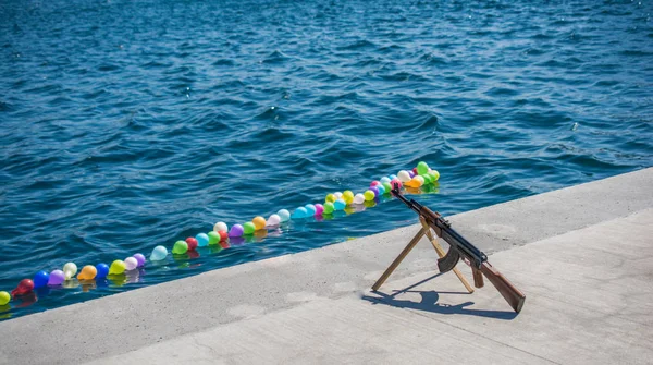 Balloon on a string  on water for shooting game