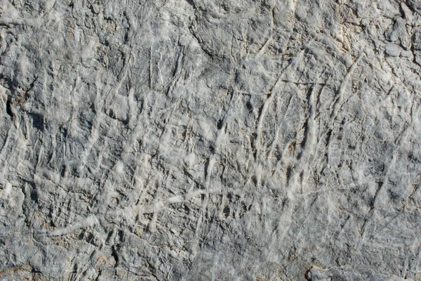 Doğal kaya, arka plan dokusu olarak taş yüzeyi.
