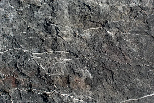 Arka plan dokusu olarak doğal kaya veya taş yüzeyi