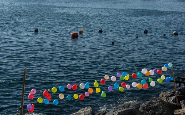 Balloon on a string  on water for shooting game