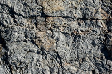 Arka plan dokusu olarak doğal kaya veya taş yüzeyi