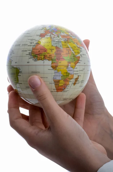 Criança Segurando Pequeno Globo Mão Sobre Fundo Branco — Fotografia de Stock