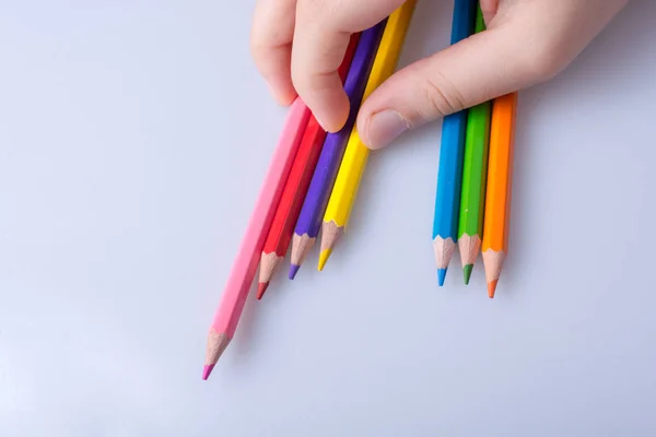 Hand Holding Color Pencils Placed White Background — Stock Photo, Image