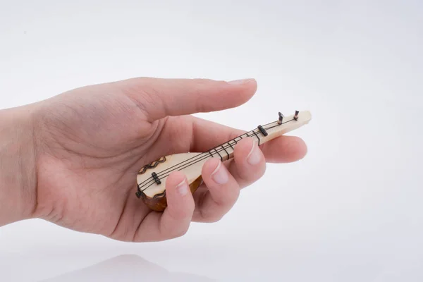 Hand Holding Turks Muziekinstrument Saz Een Witte Achtergrond — Stockfoto