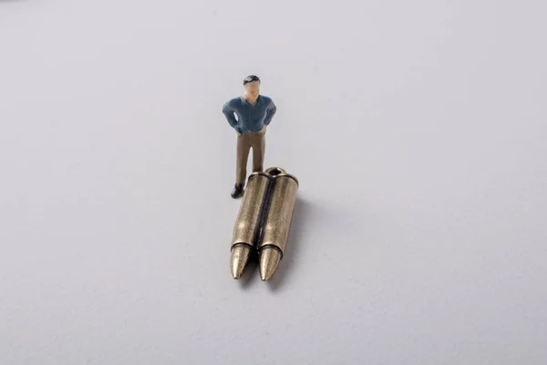 Man Figurine Model Bullet Conceptual War Photography — Stock Photo, Image