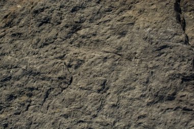 Arka plan dokusu olarak doğal kaya veya taş yüzeyi