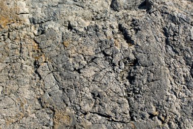 Arka plan dokusu olarak doğal kaya veya taş yüzeyi