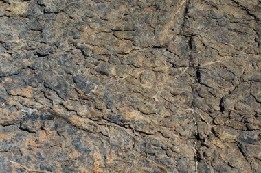 Arka plan dokusu olarak doğal kaya veya taş yüzeyi