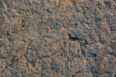 Arka plan dokusu olarak doğal kaya veya taş yüzeyi