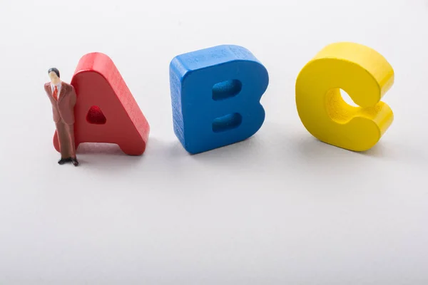 Figurka Mężczyzny Litery Abc Alfabet Biały — Zdjęcie stockowe