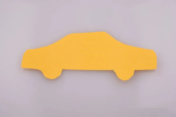 Car Shape Cut Out Yellow Paper Grey Background — Stock Photo, Image