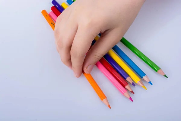 Hand Holding Color Pencils Placed White Background — Stock Photo, Image