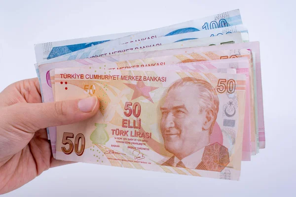 Χέρι Που Κρατά Τραπεζογραμμάτια Λίρες Τουρκικά Λευκό Φόντο — Φωτογραφία Αρχείου