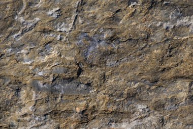 Arka plan dokusu olarak doğal kaya veya taş yüzeyi