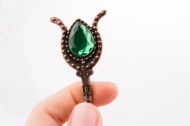 Çay kaşığı tarz bir Retro tutan el