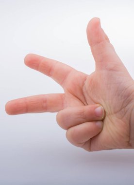 Üç numaralı jest yapmak çocuğun el