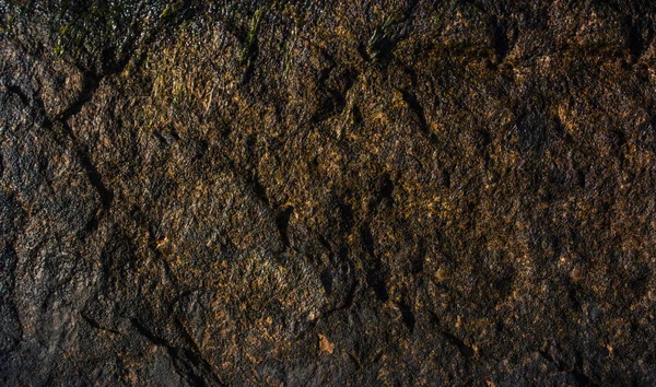 Arka plan dokusu olarak doğal kaya veya taş yüzeyi