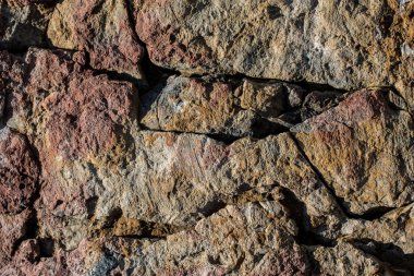 Doğal kaya, arka plan dokusu olarak taş yüzeyi.