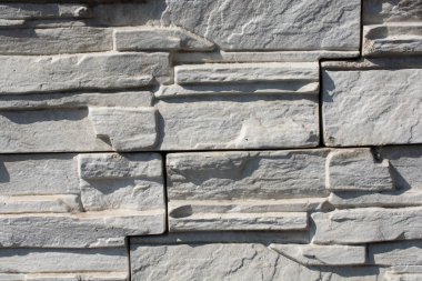 Aynı tip ve taştan yapılmış duvar.