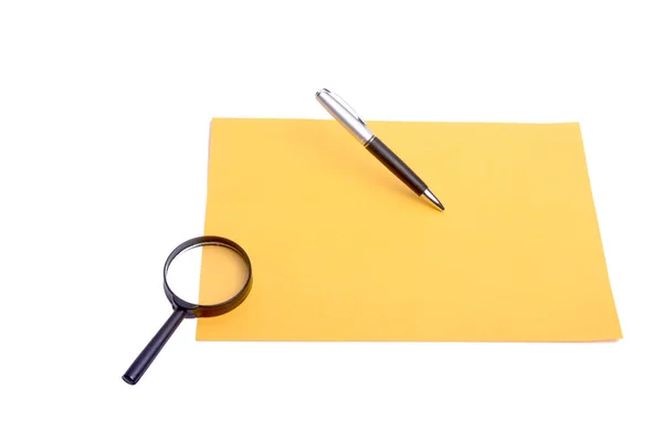 Stylo Loupe Placés Sur Papier Jaune — Photo