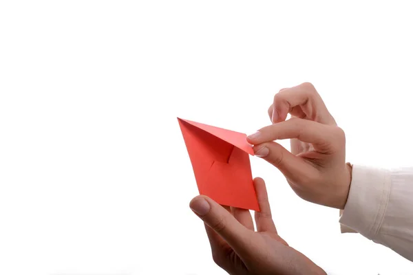 Mano Sosteniendo Sobre Rojo Sobre Fondo Blanco — Foto de Stock