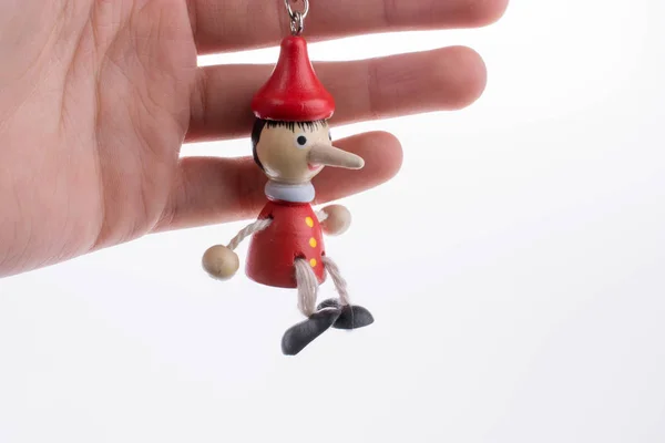 Pinocchio Puppe Aus Holz Mit Langer Nase Auf Weißem Hintergrund — Stockfoto