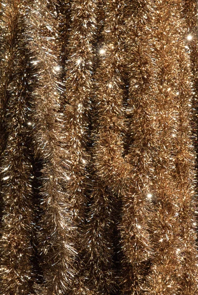 ビューで金色のクリスマスの装飾の束 — ストック写真