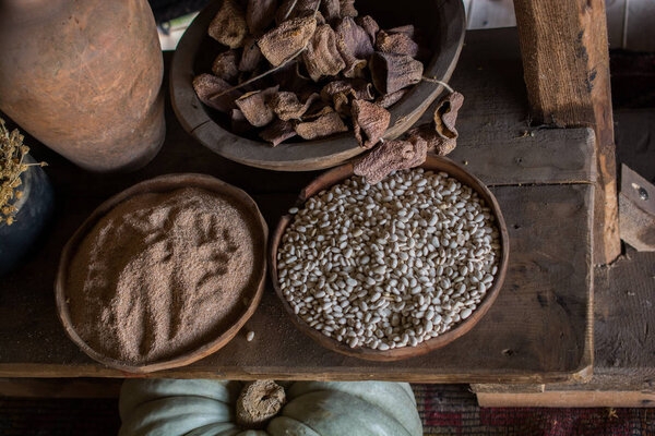 Beans, grains on wooden bowls in the view