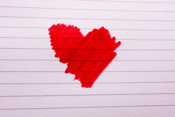 Rotes Herz Auf Einem Gefüllten Notizbuch — Stockfoto