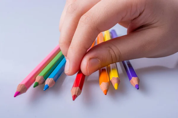 Hand Holding Color Pencils Placed White Background — Stock Photo, Image