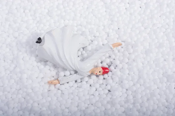 Sufi Whirling Dervish on little white polystyrene foam balls