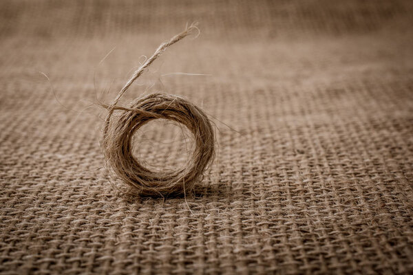 Roll of brown color linen string paper background