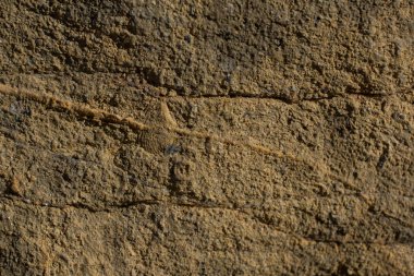 Doğal kaya, arka plan dokusu olarak taş yüzeyi.