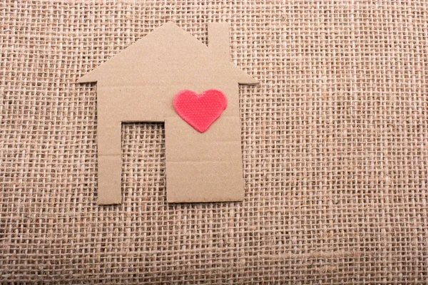 Forma Corazón Forma Casa Cortado Papel Con Fondo Lona — Foto de Stock