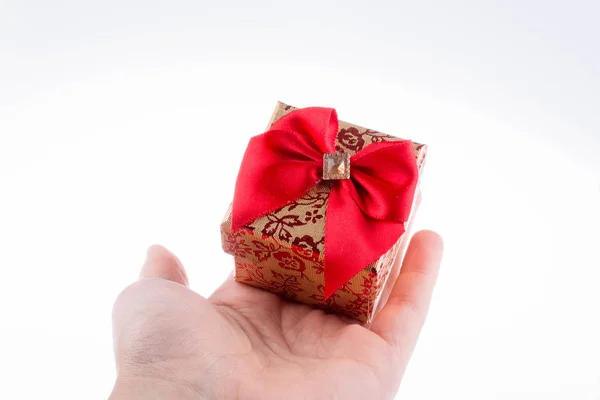 Hand Holding Gift Box Red Ribbon — Stock Photo, Image