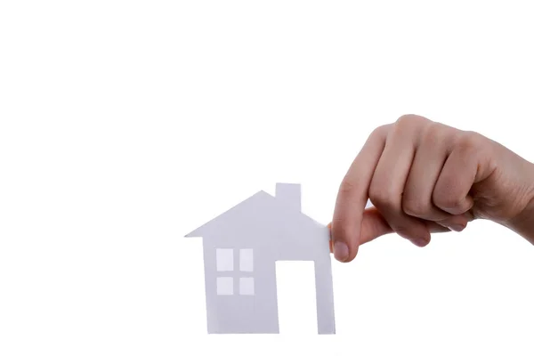 Hand Met Een Geïsoleerde Papier Huis Met Een Witte Achtergrond — Stockfoto