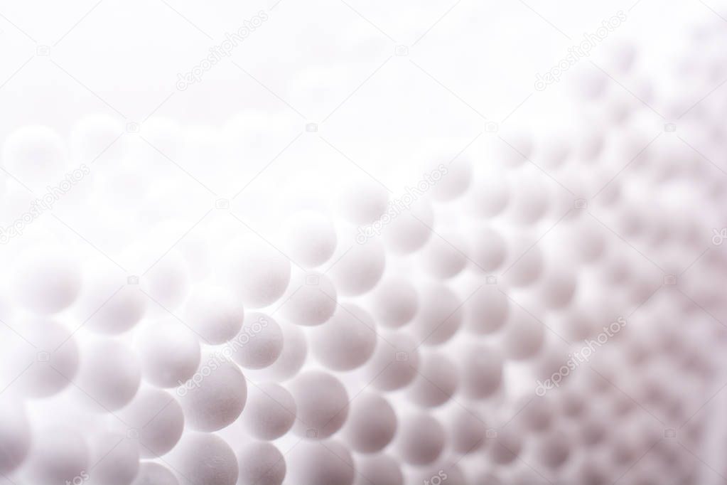White little polystyrene foam balls as background