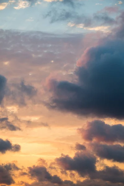 Dark and grey clouds are in the sky