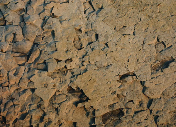 Arka plan dokusu olarak doğal kaya veya taş yüzeyi