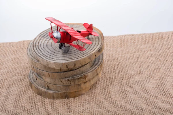 Red Color Toy Plane Wooden Texture — Stock Photo, Image