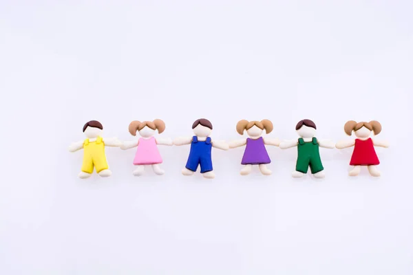 Niños Vestidos Colores Figuras Sobre Fondo Blanco — Foto de Stock