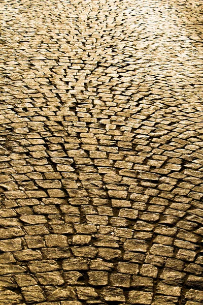 kaldırımlı bir kaldırım taşının dokuma arkaplanı