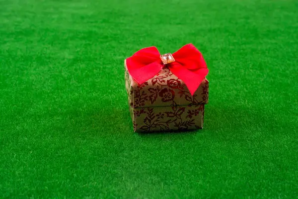 Gift Box Wrapped Placed Green Fake Grass — Stock Photo, Image