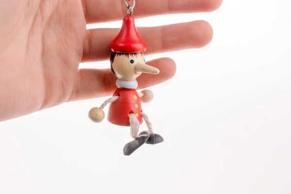 Pinocchio Puppe Der Hand Auf Weißem Hintergrund — Stockfoto