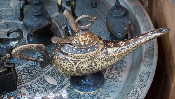 Aladdin lamp of wishes in metal with patterns  in view