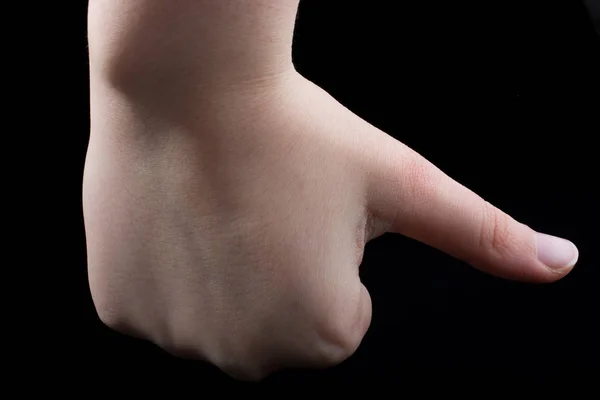 Mano Joven Gesticulando Sobre Fondo Negro —  Fotos de Stock