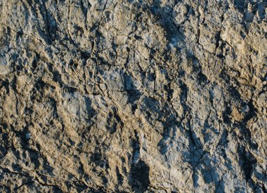 Arka plan dokusu olarak doğal kaya veya taş yüzeyi