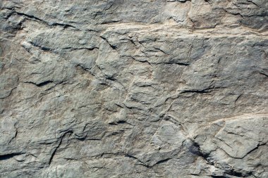 Arka plan dokusu olarak doğal kaya veya taş yüzeyi